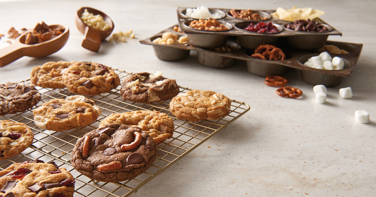 cooling rack of cookies with various mix-ins.