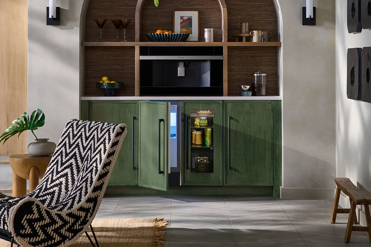 Sub-Zero undercounter ice maker with undercounter beverage center and Wolf coffee machine